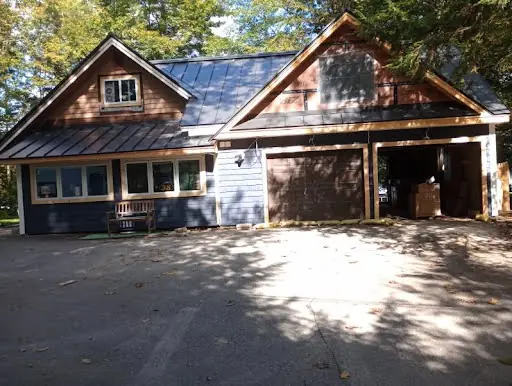 Garage and home exterior during renovation work