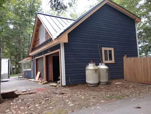 Side of garage during exterior renovation work