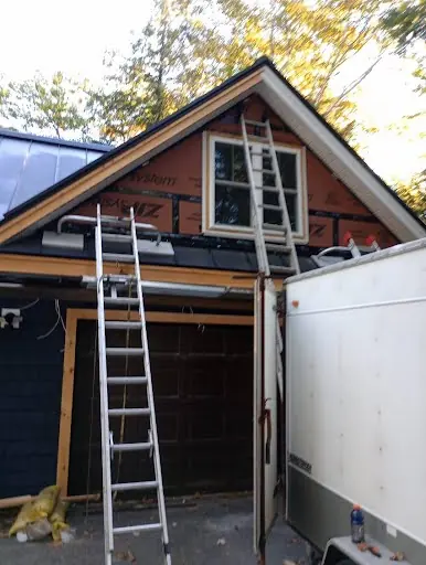 Garage gable framing and exterior renovation in progress